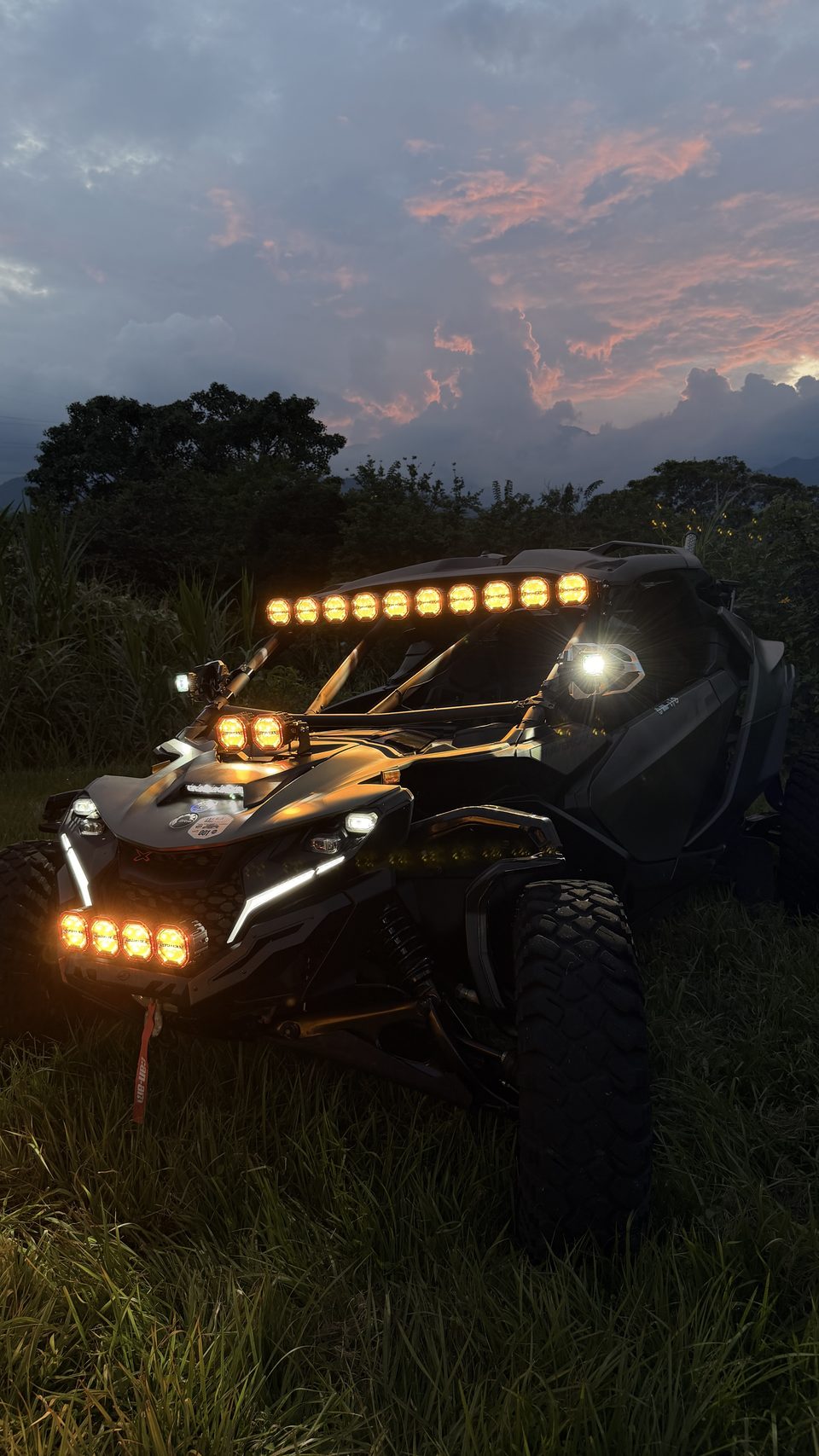 UTV with an RXT amber light bar at dusk